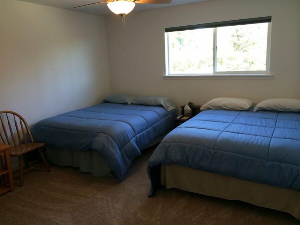 Bear's Den room (2 queen beds) with a private bathroom.