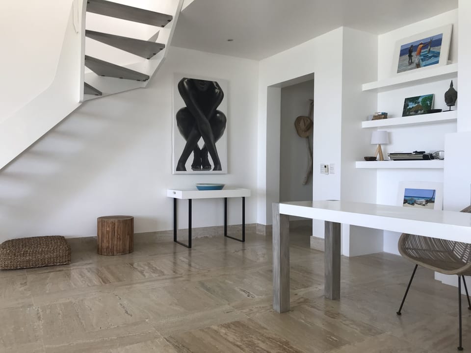 living room with desk in case you need to work with fast internet
