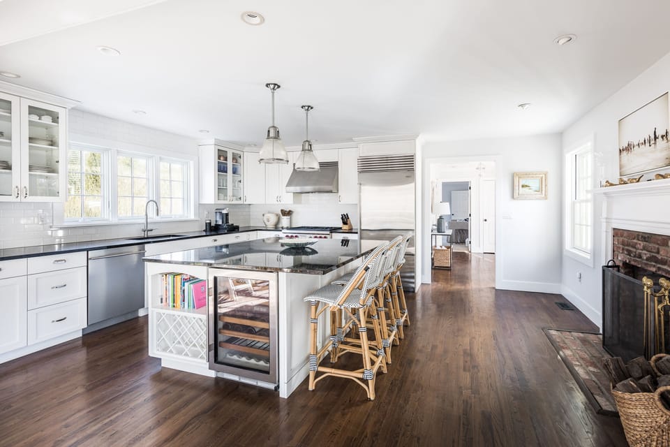 fully outfitted kitchen with wood burning fire place