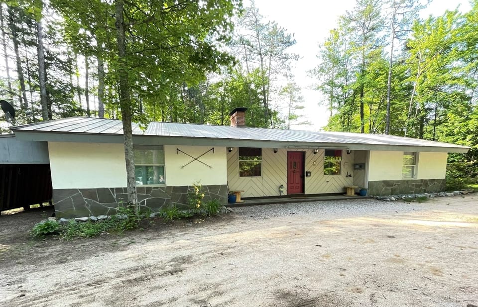 Single level with carport for keeping your toys undercover