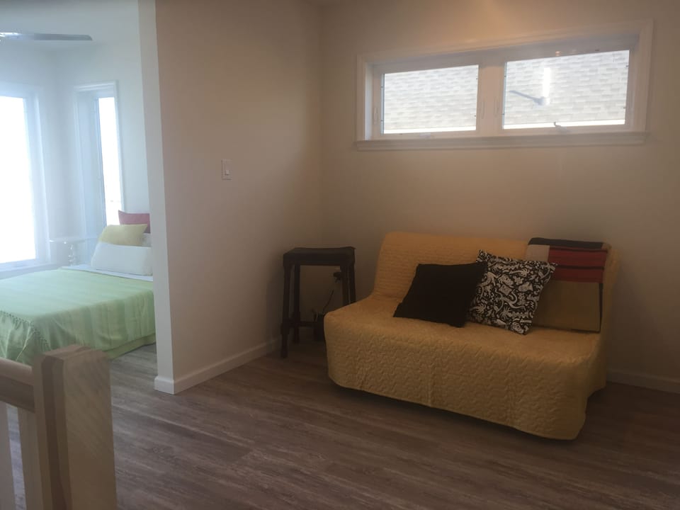 Second floor seating area with pullout couch that sleeps two. 