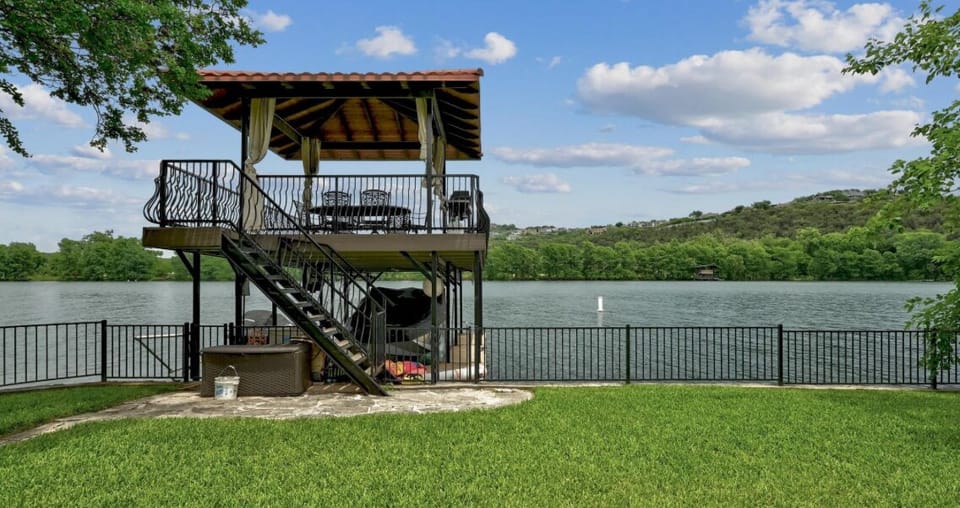 Boat slip (message), full dock, and water trampoline + paddle boards and kayaks!