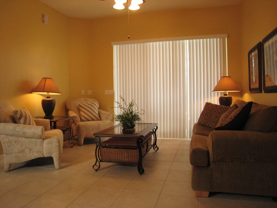 Formal Living room, with access to the pool deck and lanai