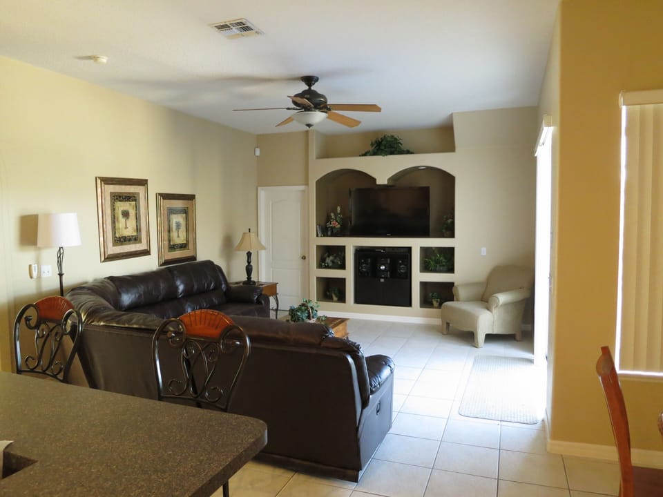 Main Family Room, New Leather Sectional 55inch HDTV, Cable, PVR System, & Wi-Fi