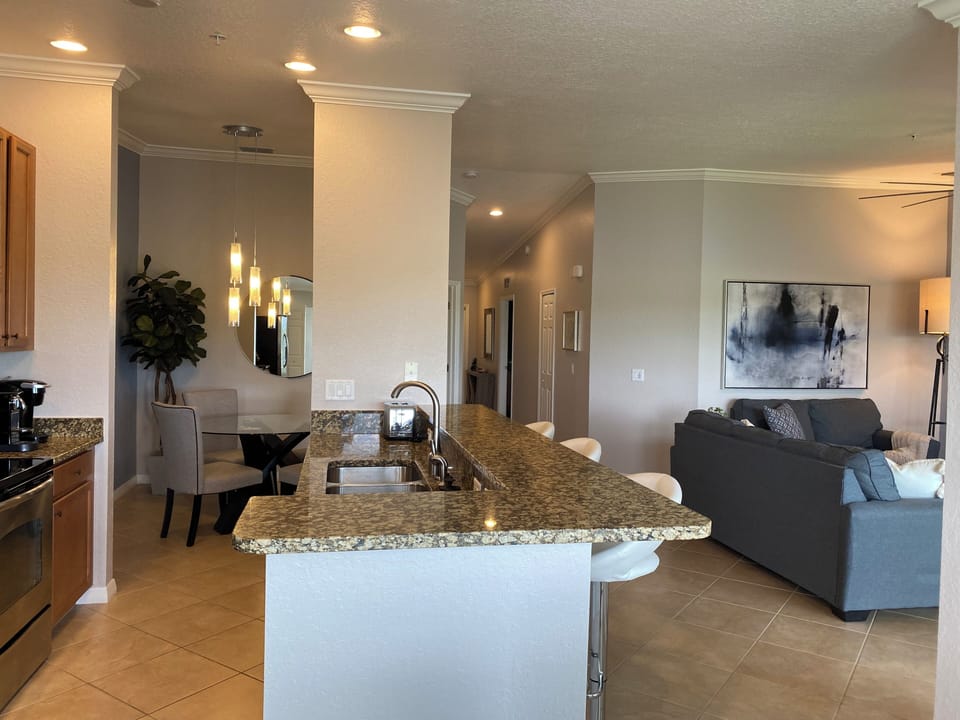The spacious and bright open-concept areas include ceramics throughout.
