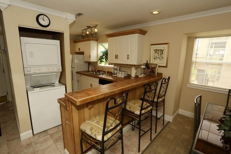 Kitchen island offers seating for 3.