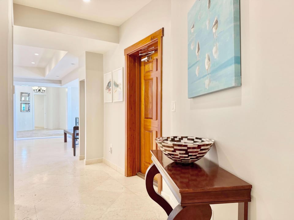 Bright and airy hallway with elegant wooden accents