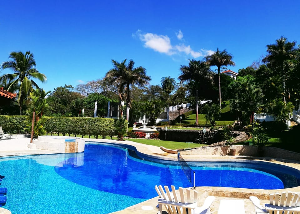 Large Pool with a swim up bar and Jacuzzi Hot Tub, Water volleyball net