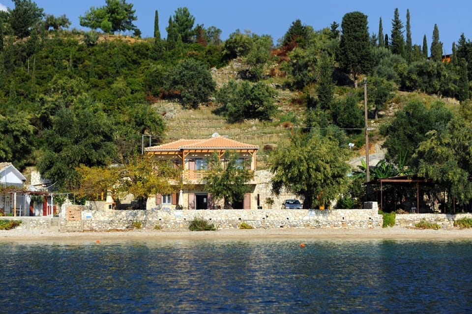 Exclusive beachside villa in a picturesque bay with crystal clear waters