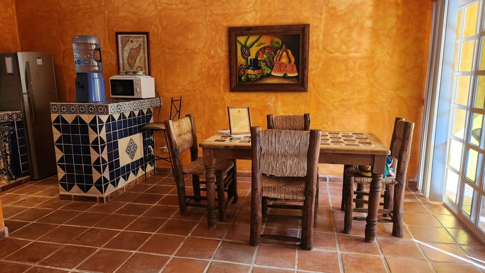 Hand-crafted furniture in dining room; stay with us for a true holiday escape.