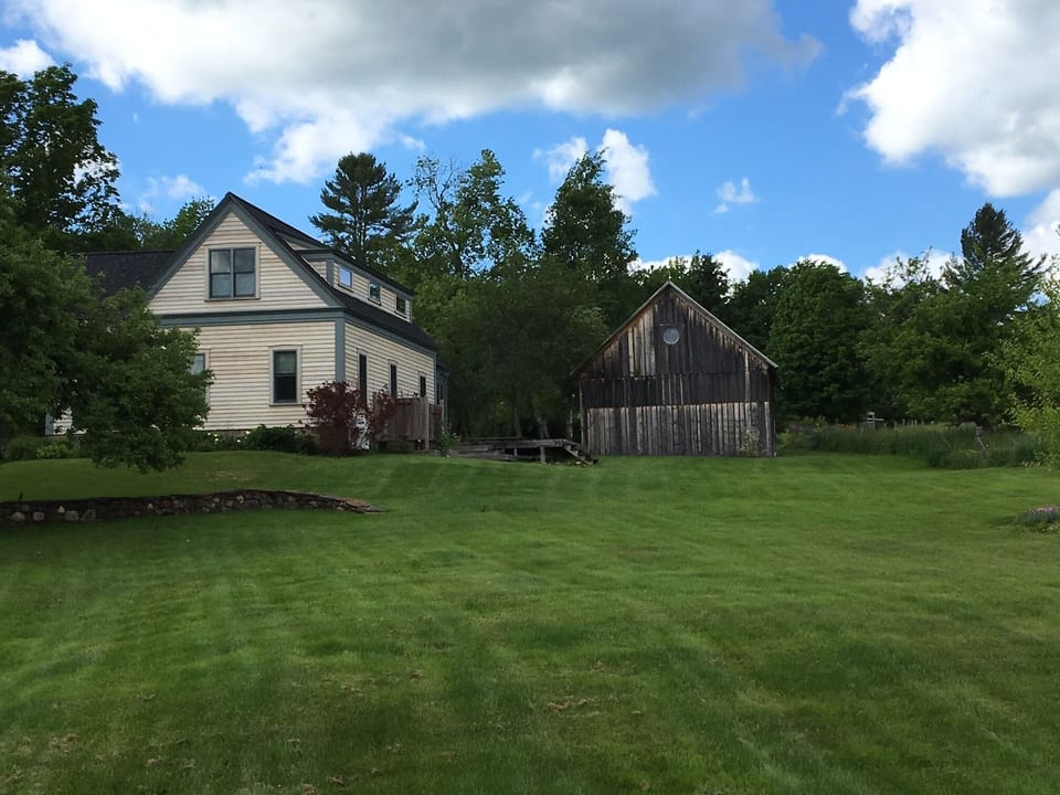 view from backyard.  yes, that's a stained glass window in the barn