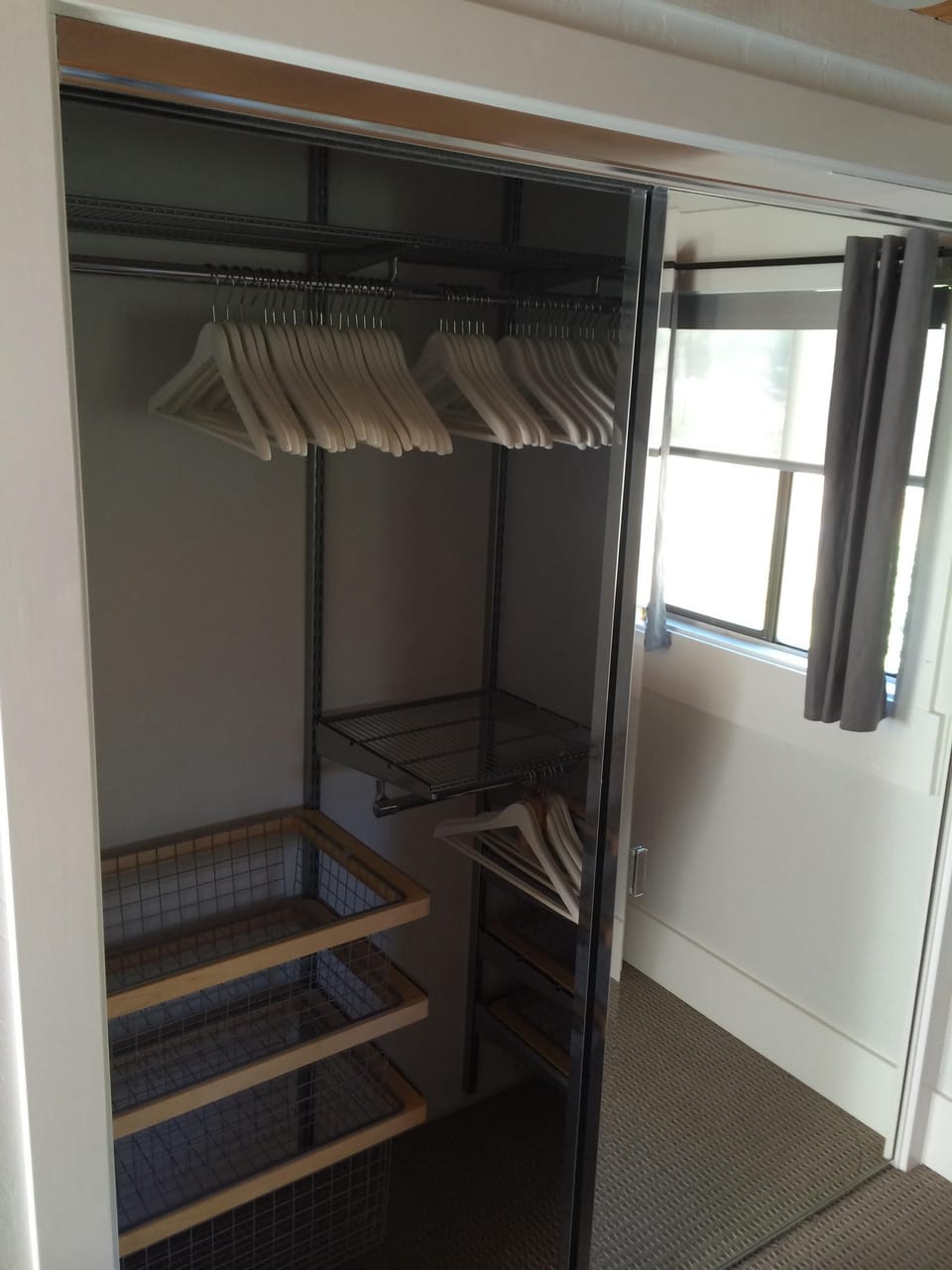 Both bedroom closets have full built-in shelves and drawers 