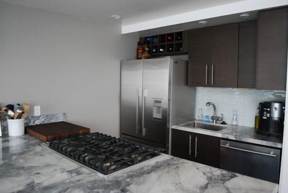 Chef's kitchen with stainless steel appliances and Viking 6 burner cooktop