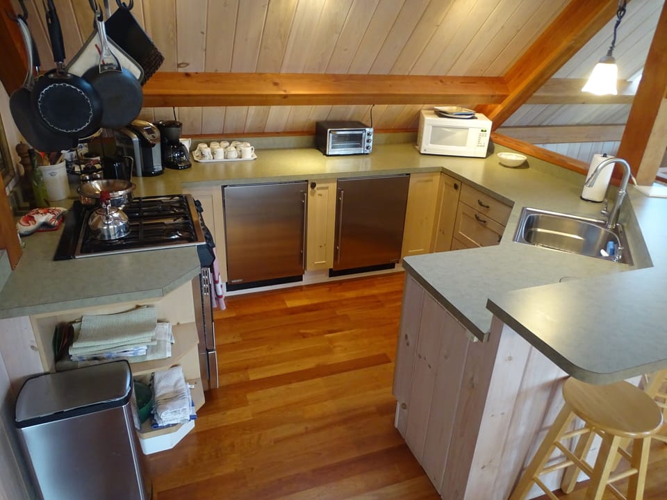 Kitchen area with Sub-Zero fridges and Thermidor range