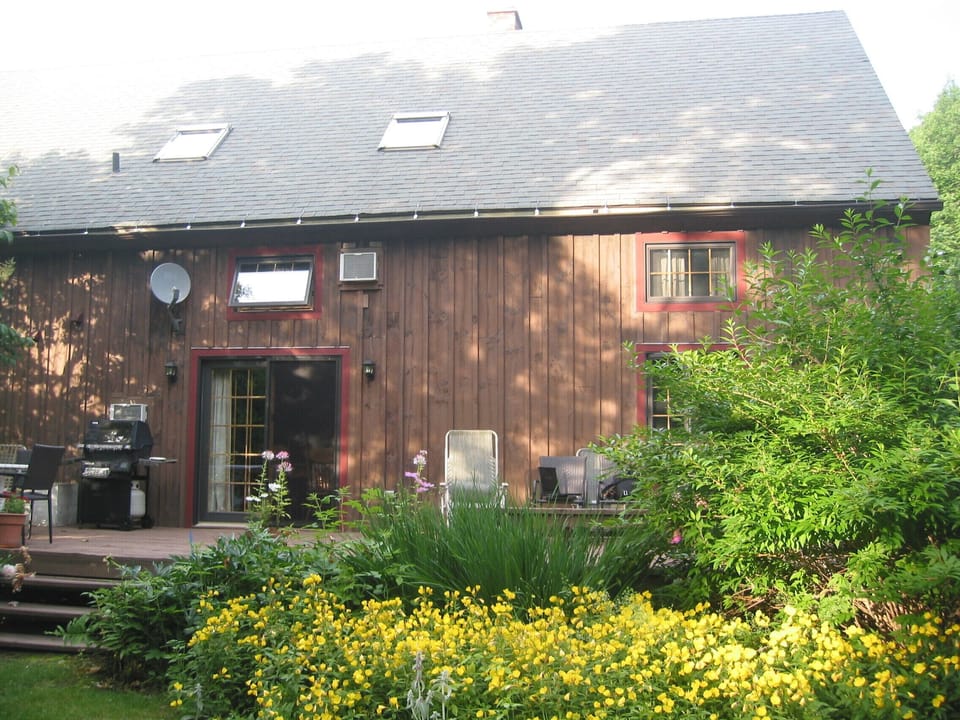 Exterior side of house--wrap around deck