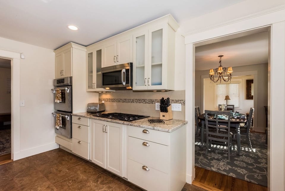 Kitchen: Jenn Air gas top stove, microwave and double ovens. All new cabinets