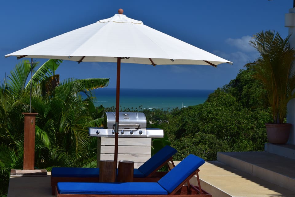 Outside barbecue ...enjoy the view and have your morning coffee on the sunbeds