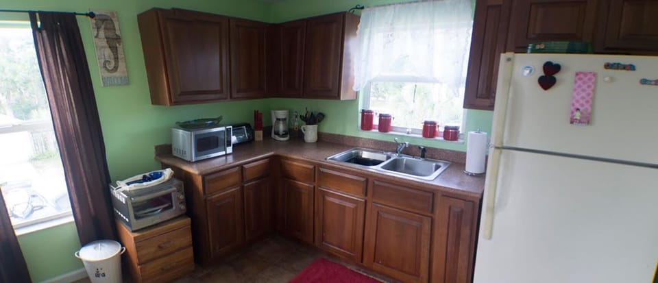 Kitchen, has full size frig.