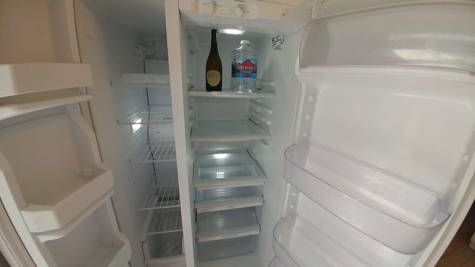 Side by Side refrigerator with California water and wine waiting for you!