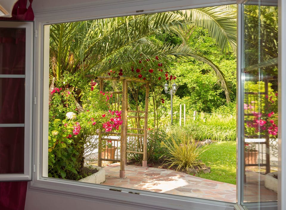 Garden view from the romantic bed room