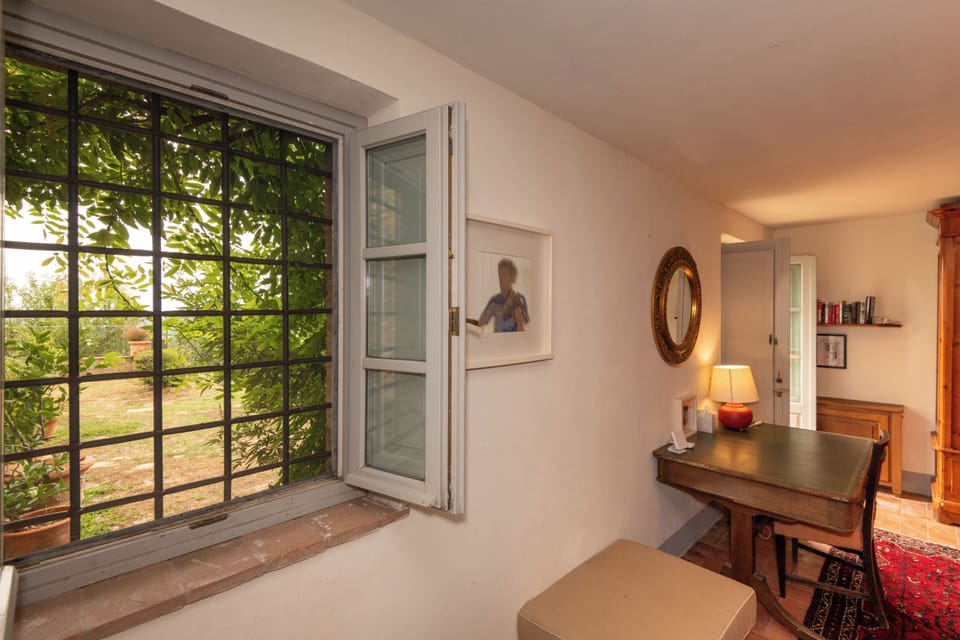 The largest bedroom in the villa includes a desk