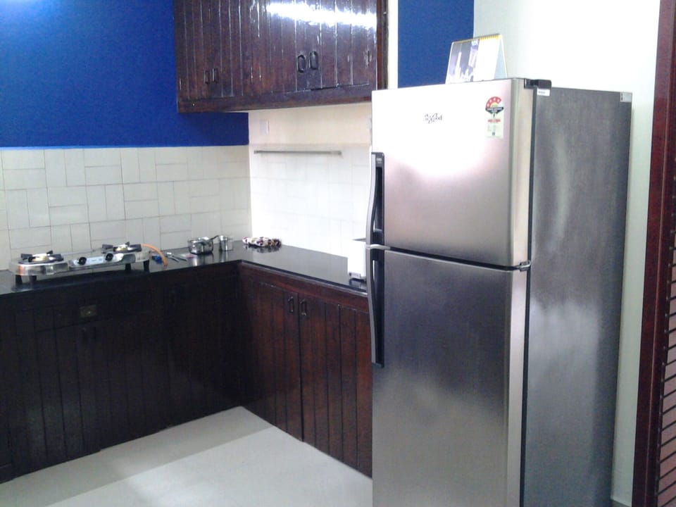The kitchen with large fridge