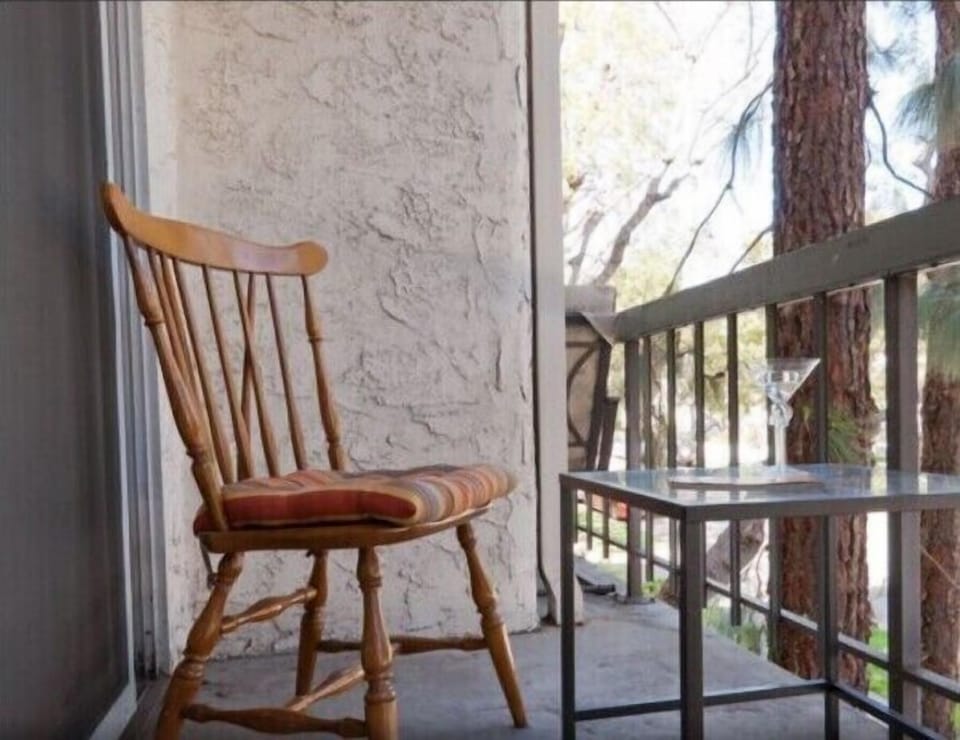 Relax on the balcony overlooking a quite residential neighborhood.