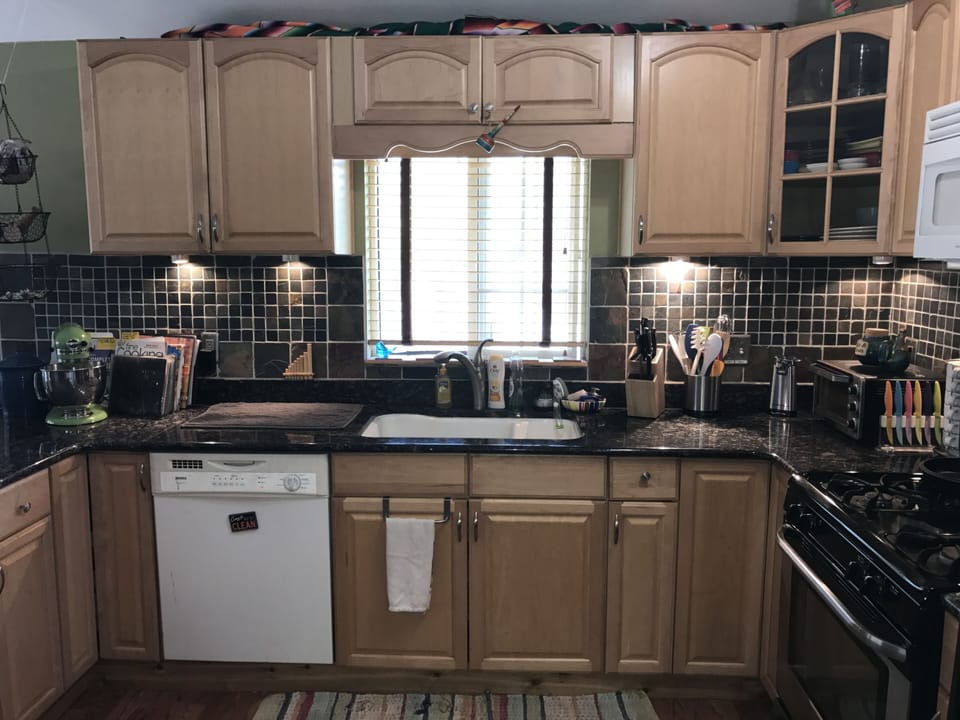 Kitchen with dishwasher and deep sink