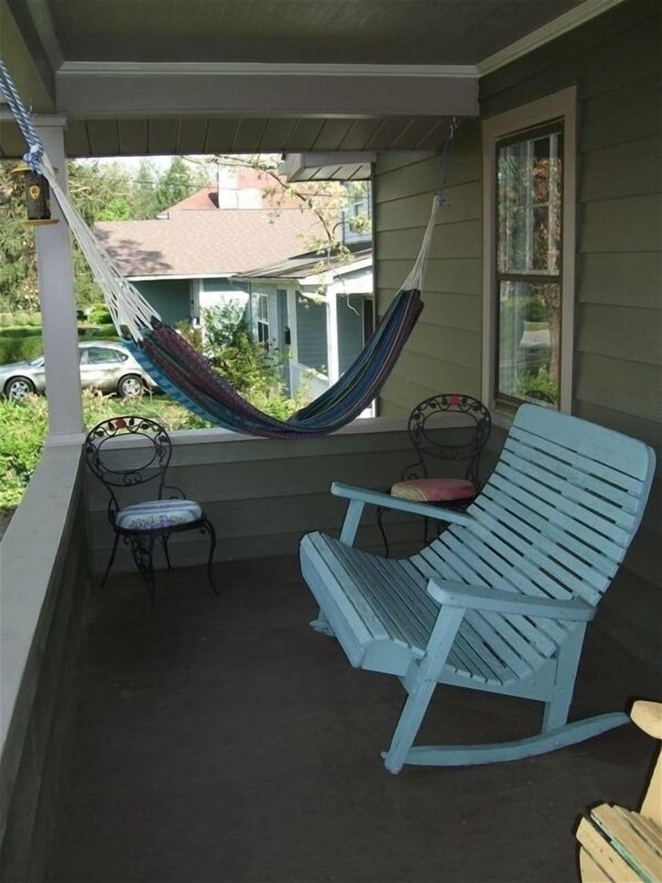 Enjoy the outside porch on a very quiet street.