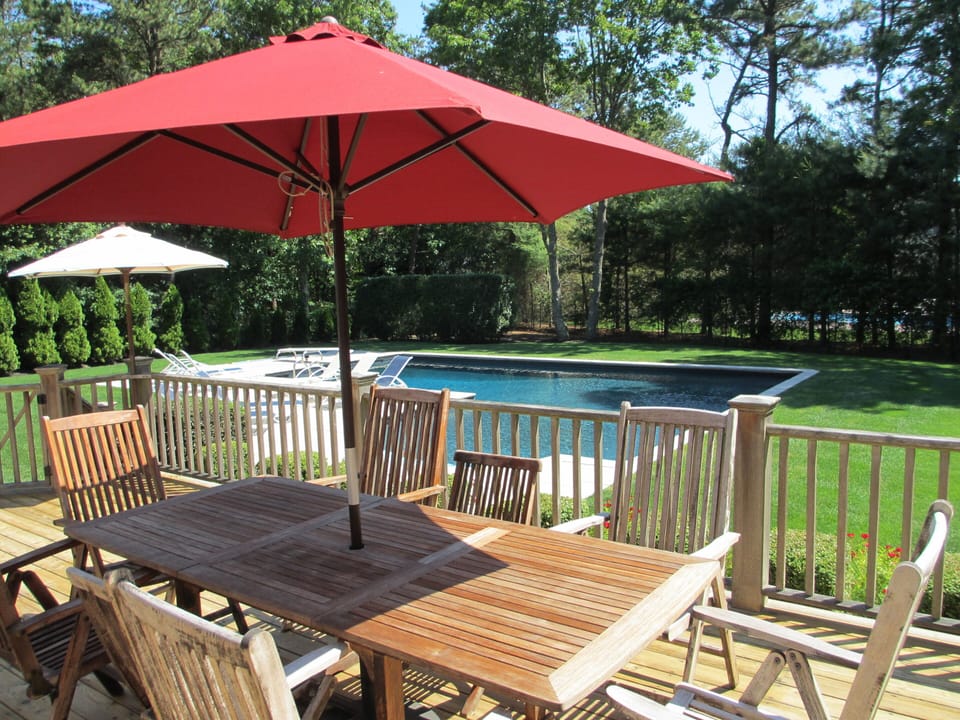 Al fresco dining on the deck overlooking the pool.
