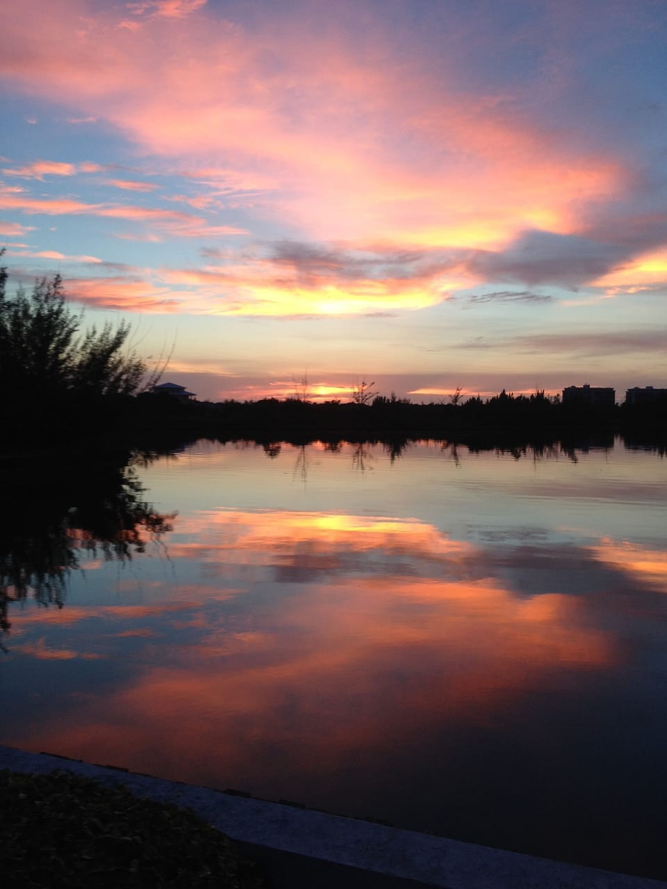 Beautiful sunsets over canal with Port Lucays in the distance.