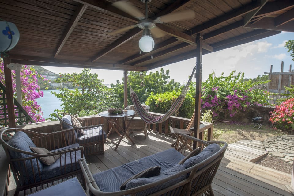 Veranda with fan and garden with BBQ