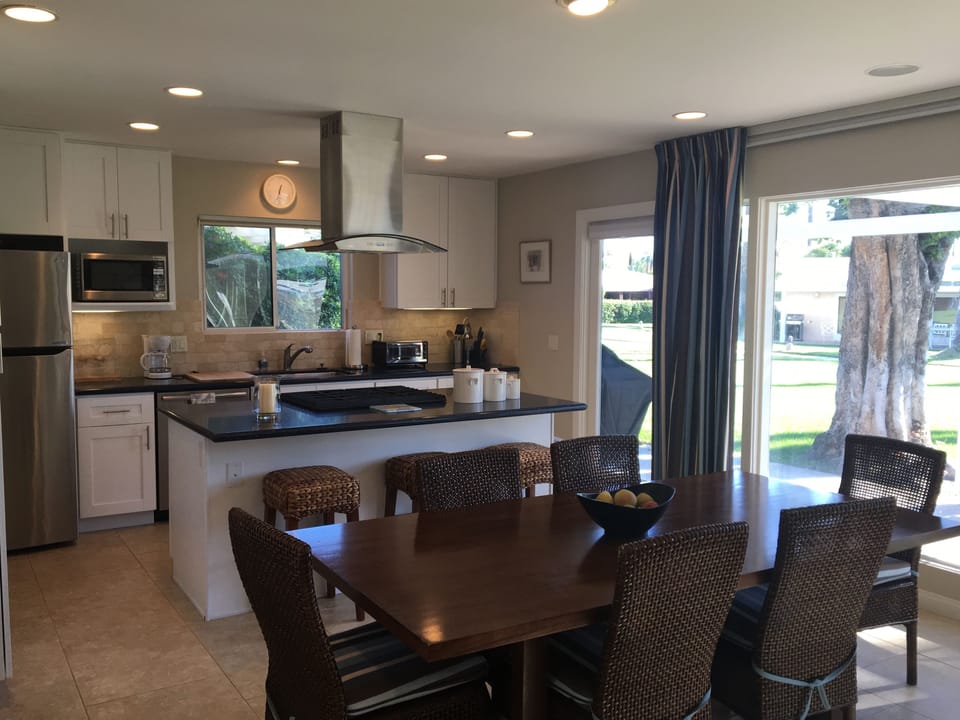 Dining room and kitchen,  bbq on patio. 