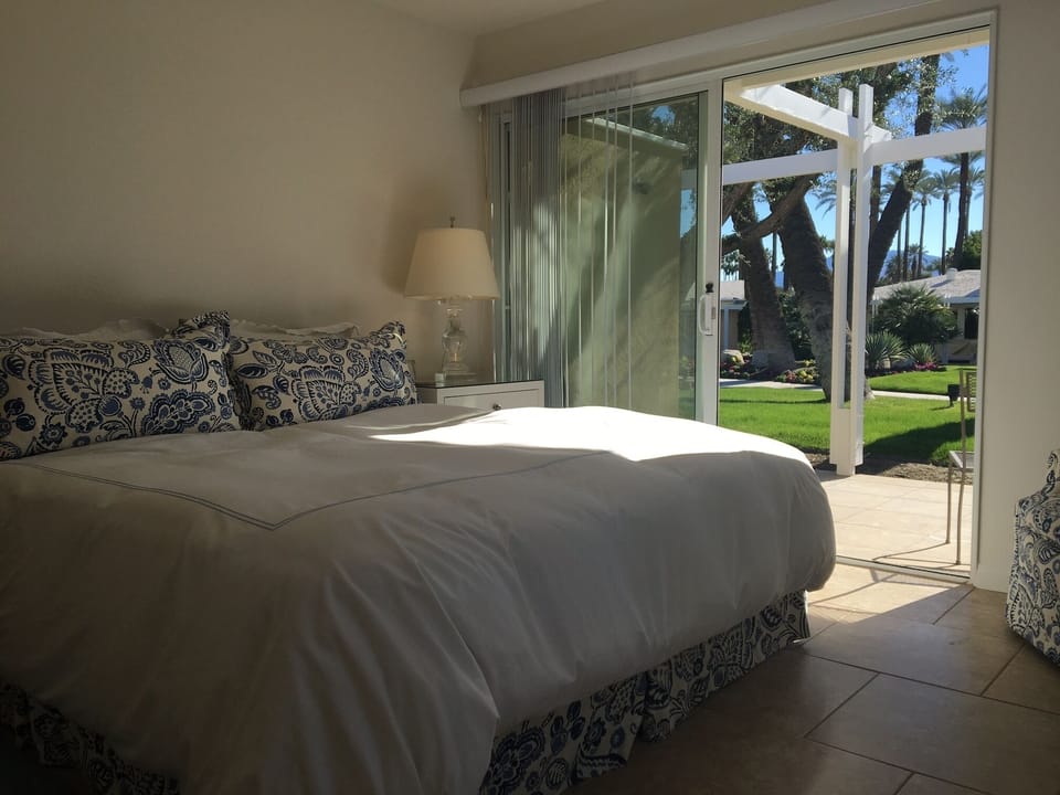 Master bedroom, looking out on common area. 