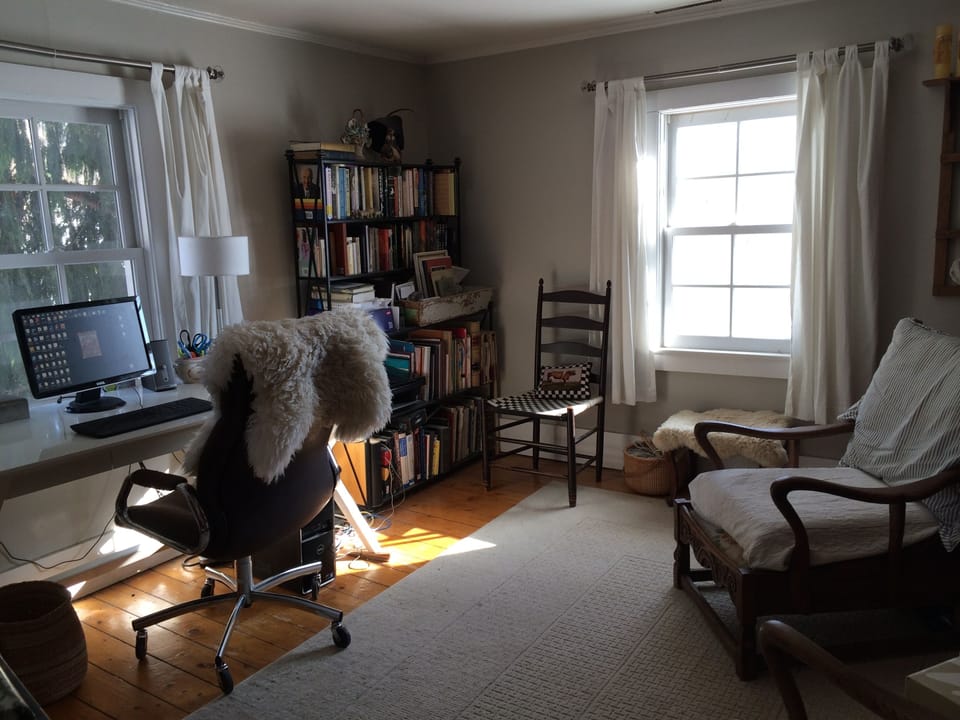 Upstairs office with desktop computer and printer