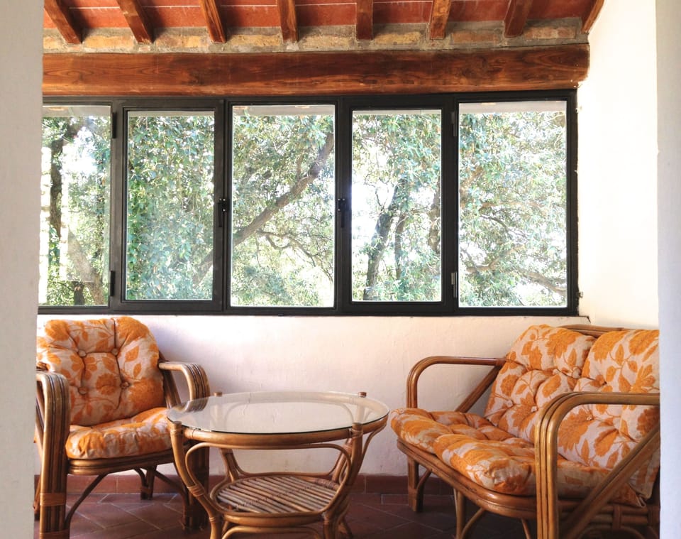 The covered veranda of the apt. Maria