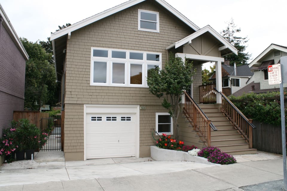 Private entry through gate and down walkway. Assigned parking space on left.