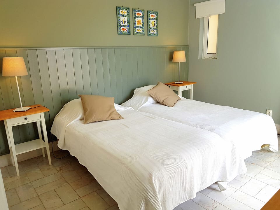 Bedroom 2 opens to pool patio