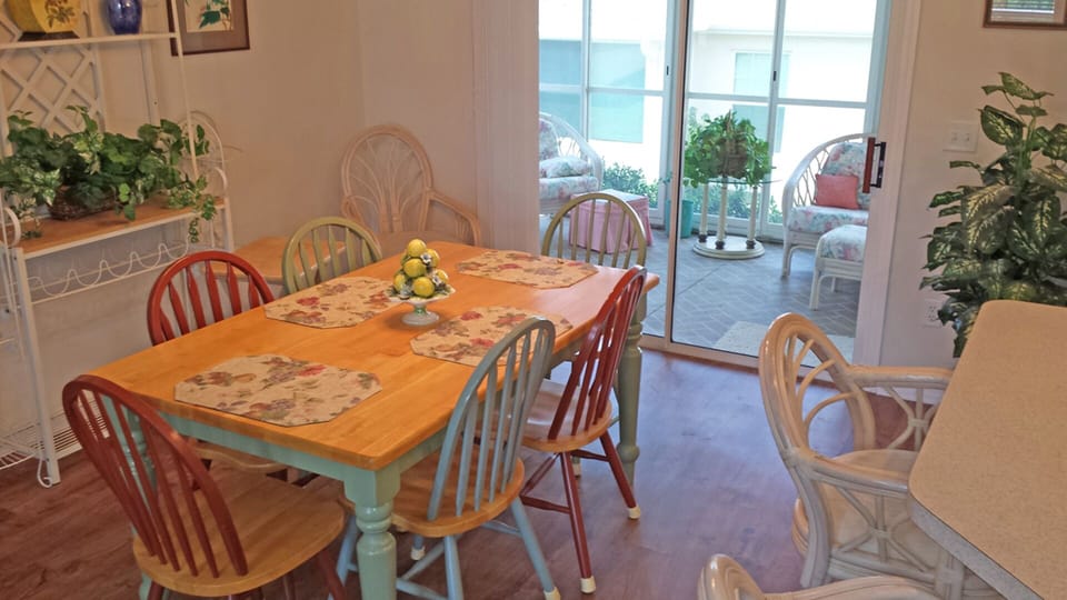 Dining area leads to enclosed lanai