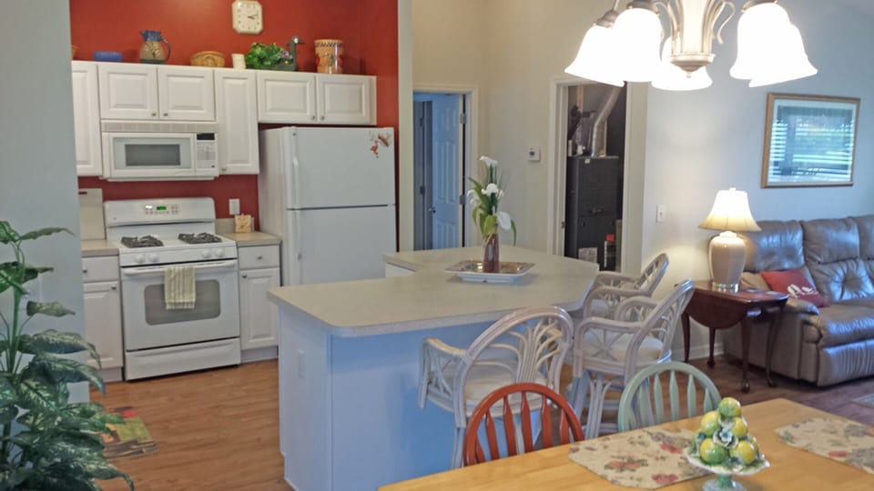 Kitchen open to living and dining areas
