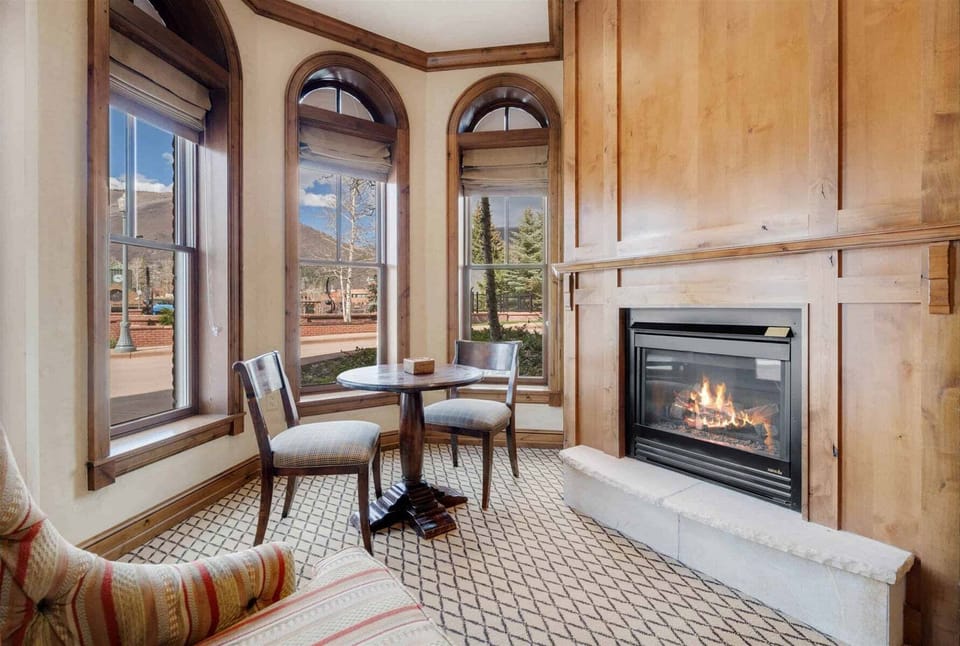 Primary bedroom features gas fireplace and kitchenette