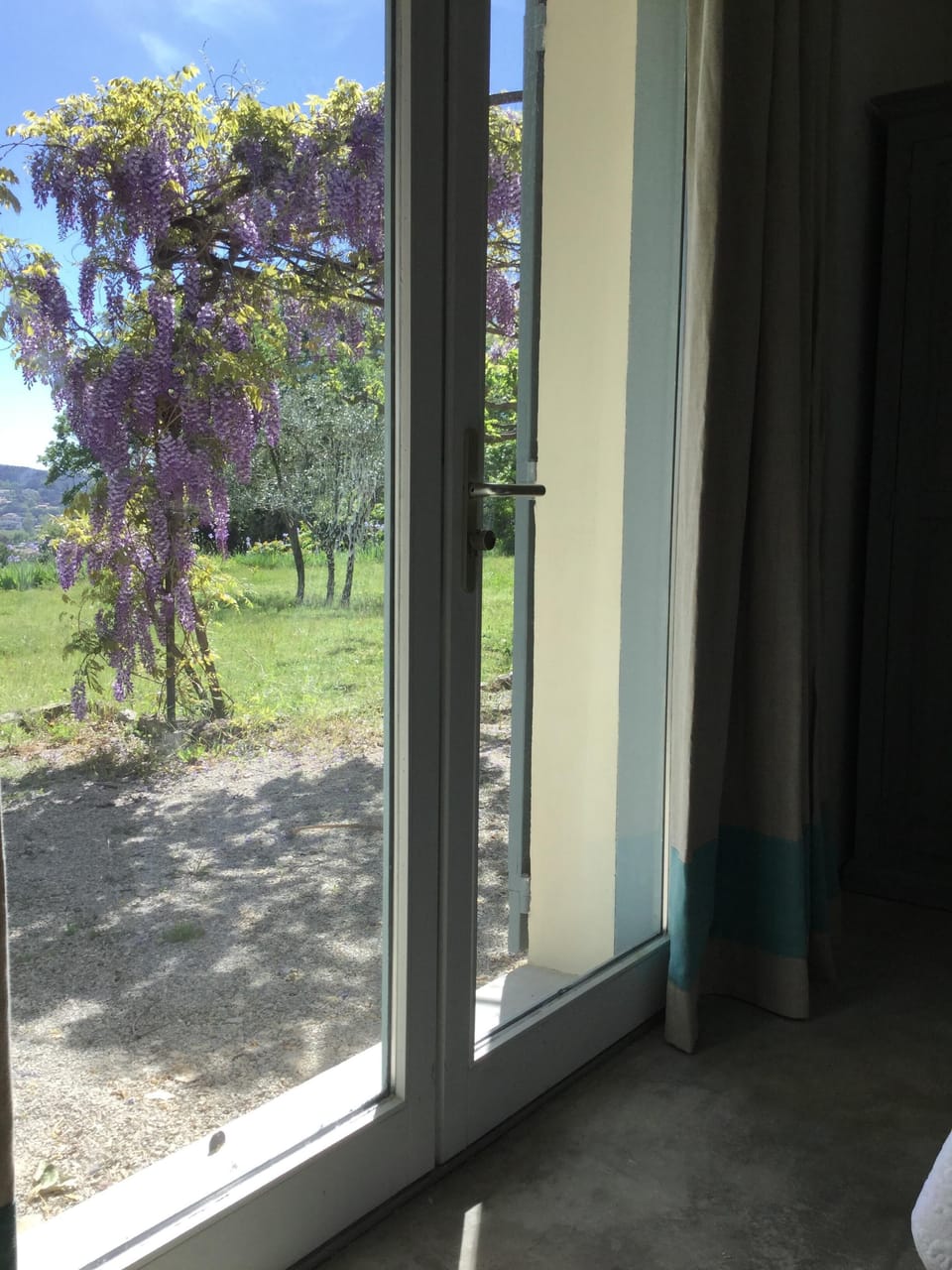 View from bedroom 2 with new French linen curtains (before garden upgrade)