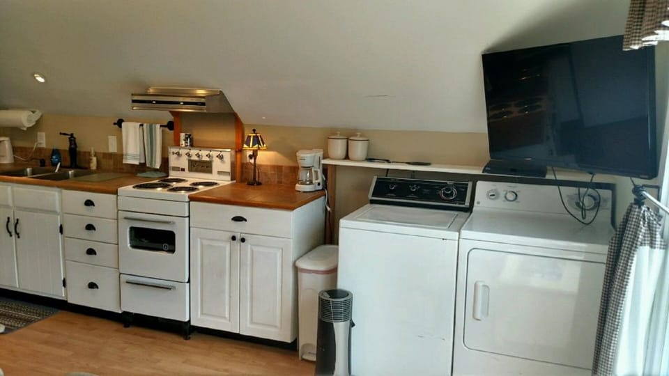 Included is a washer & dryer and a rather large TV. Dish Network