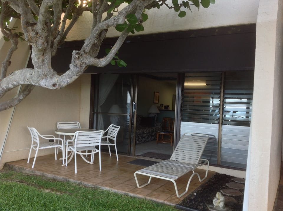 Your private lanai with motorized sunshade.