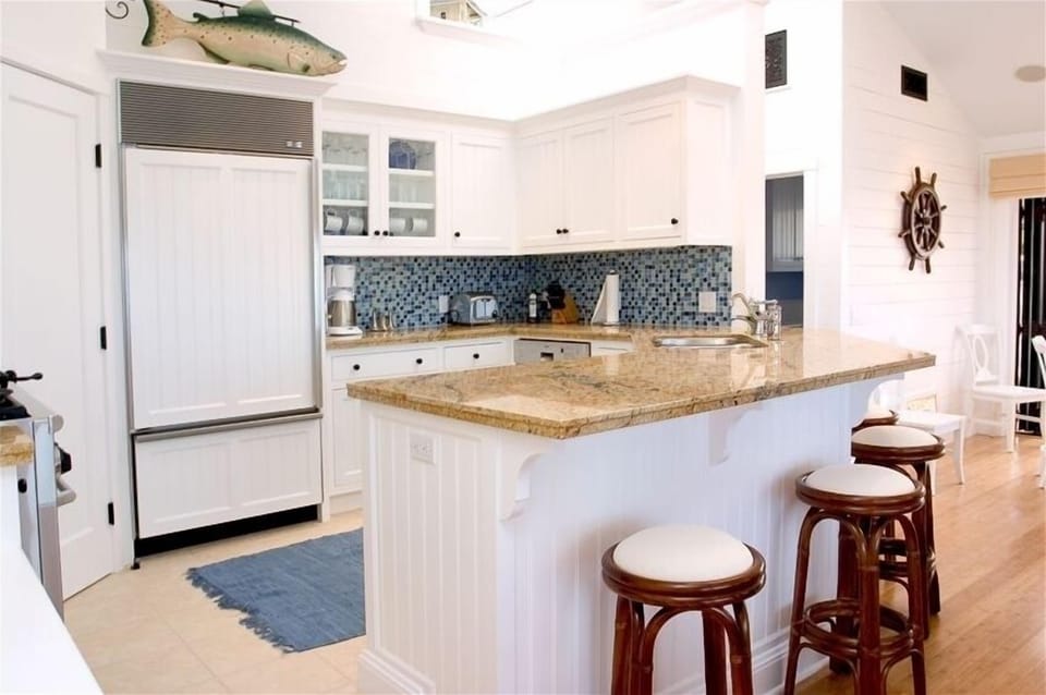 Gourmet kitchen with granite top and top of the line appliances. 