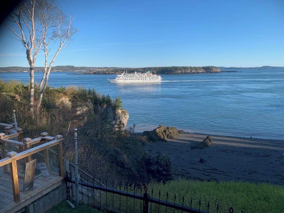 Cruise ship passing Sea Urchin Cottage in May 2024