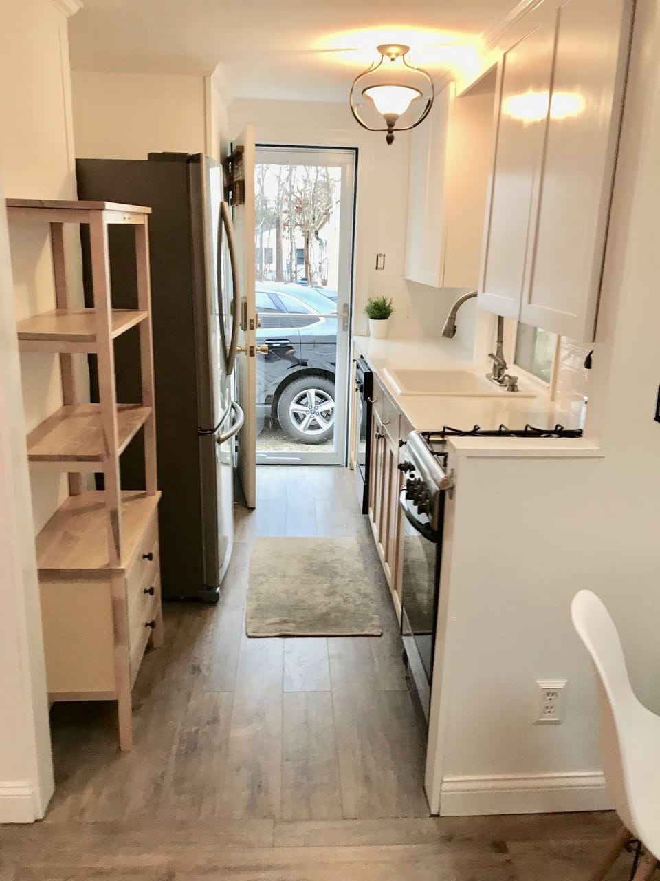 Kitchen has french fridge, dishwasher, new countertops and cabinets