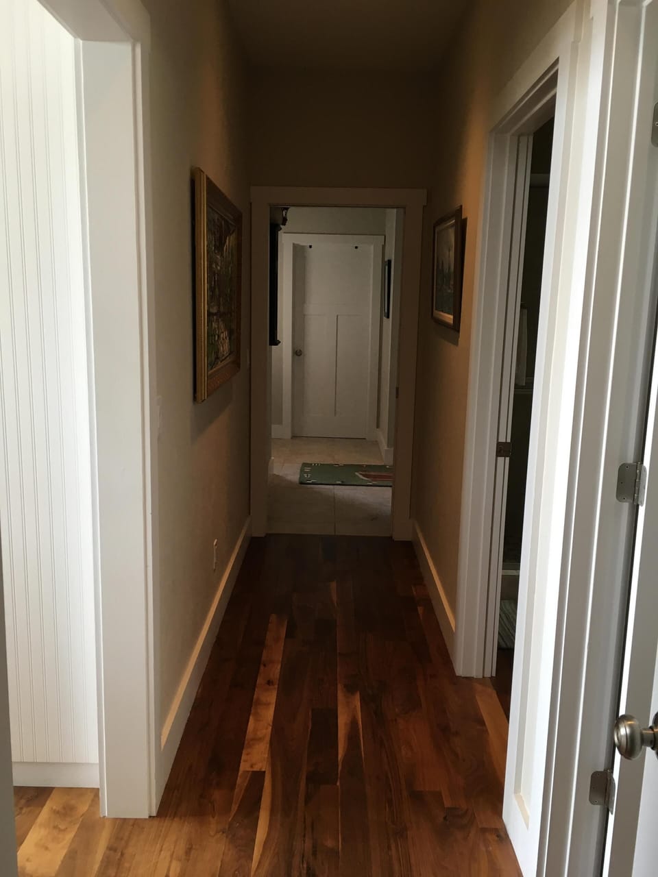 1st floor hallway to laundry and large mud room with separate entrance from main