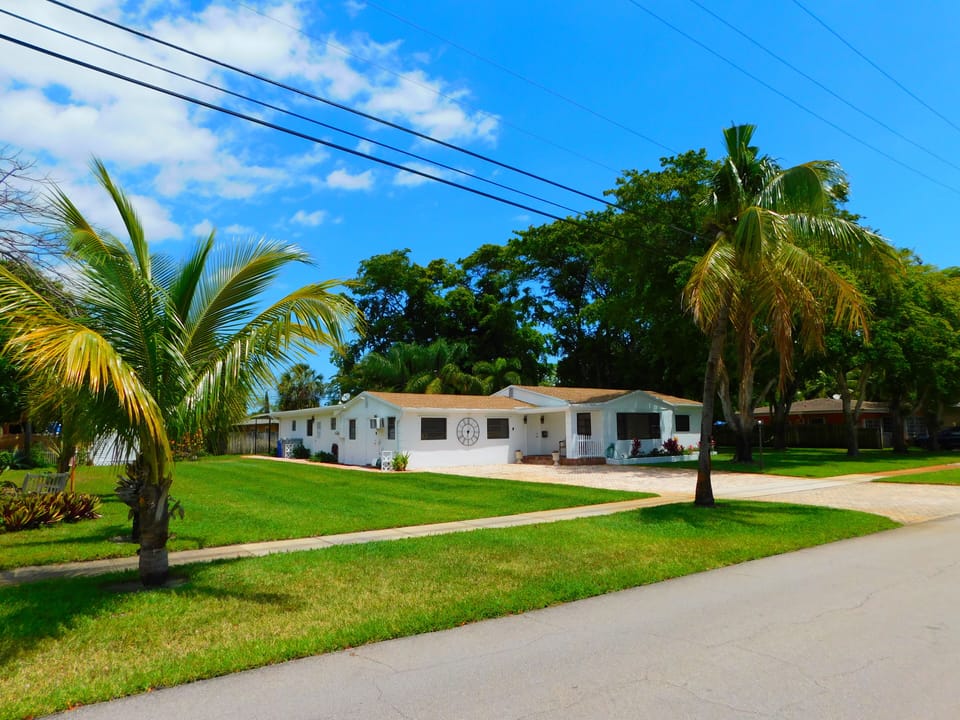 Large house and land. Across from Volleyball and playground, at baseball park.