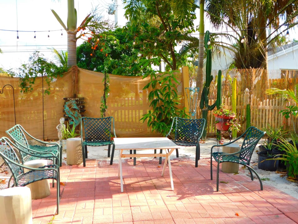 Mango area between the 2 homes. The comments are, the backyards very large.